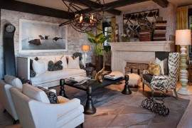 Casablanca coffee table and chandelier usher in a hint of black into the living room [Design: Green Couch Interior Design]