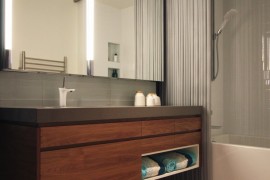 Cascade Coil shower curtain in a modern bathroom