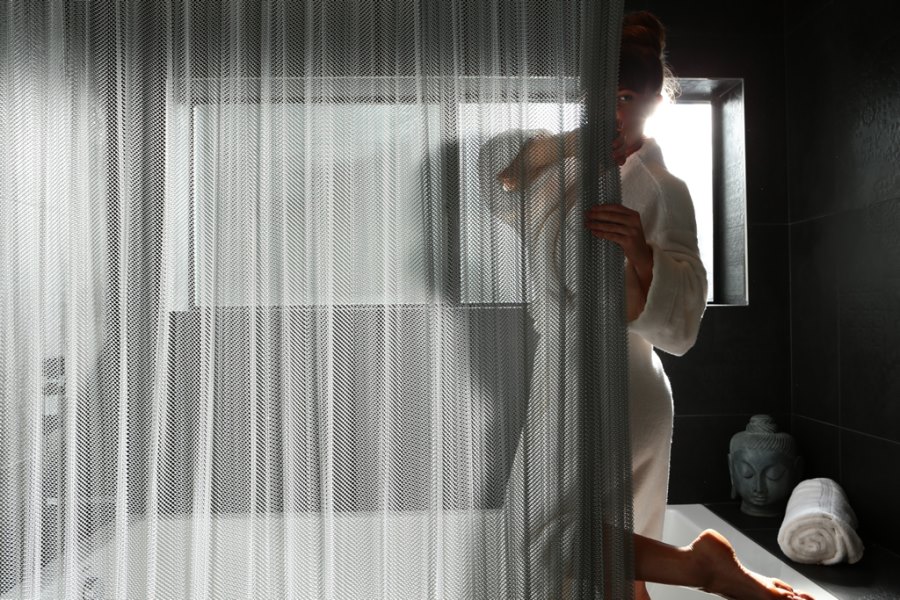 Cascade coil shower curtain