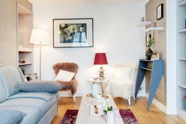 Classic Parisian style combined with shabby chic allure inside the tiny living room [Design: Nuts & Architects]