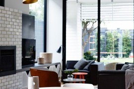 Colorful decor and lighting enliven the interior in neutral color scheme