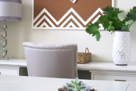Cork board with white zigzag designs at the bottom