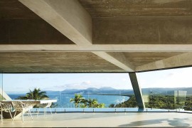 Glass walls acts as a wind breaker and safety feature even while bringing in the spectacular view