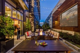 Gorgeous use of string lighting for the patio home theater
