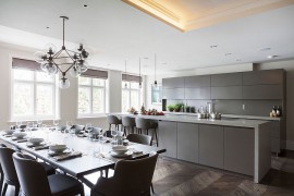 Grey kitchen cabinets and island bring refinement to the contemporary home [Design: Eggersmann London]