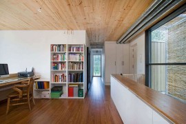 Home office on the top level of Casa Saüc with organized shlef space