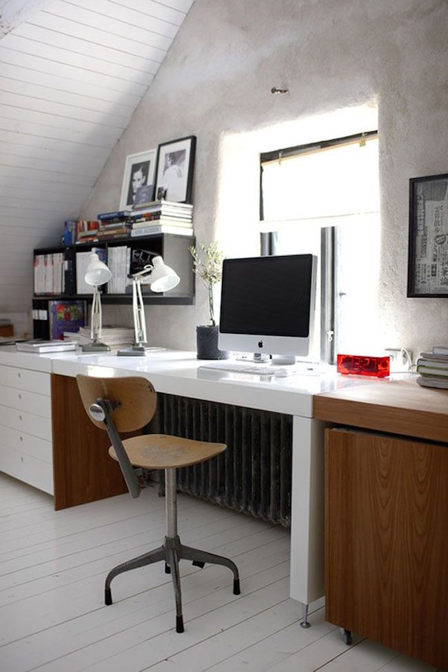 Home office with spacious desk along one wall