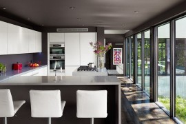 Kitchen ceiling painted in gray for a cozy ambiance [Design: Specht Harpman Architects]