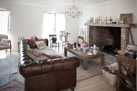 Large leather Chesterfield Sofa sits at the heart of eclectic living room [From: Rachel Ashwell Shabby Chic Couture]