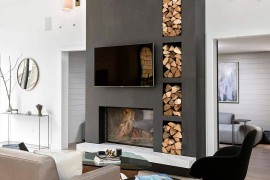 Living room of the Church conversion with gray accent fireplace wall