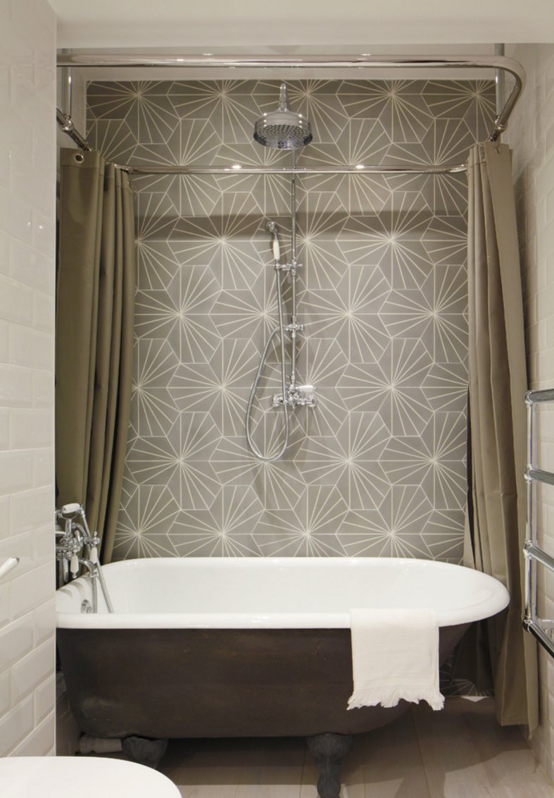 Luxury bathroom with a ceiling-mounted shower curtain rail