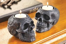 Ornate stone skull candle holders