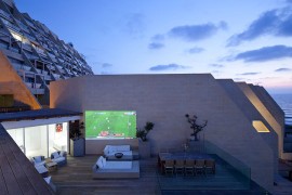 Outdoor movie night on the deck for the contemporary, urban home