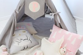Pink, white, and gray teepee for a little girl's reading nook