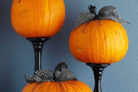 Plain pumpkins with ribbon and candlesticks