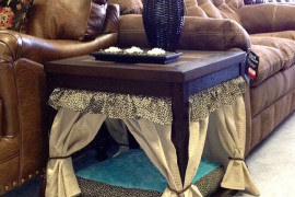 Side table transformed into a pet bed with miniature curtains
