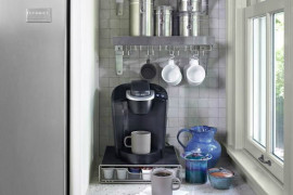 Small kitchen countertop section used for a coffee station