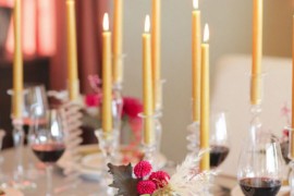 Small table with candles featured at Camille Styles