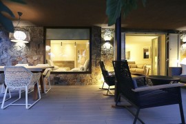 Stone walls and glass windows blend contrasting textures seamlessly
