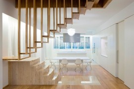Suspended timber steps create a wonderfully unique staircase for the minimal home