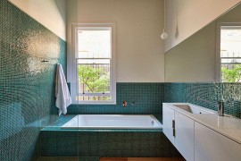 Tiles add color and sparkle to the contemporary bathroom
