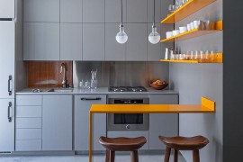 Tiny kitchen in gray with a dash of bright yellow