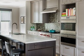 Transitional kitchen with traditional cabinets in gray