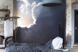 Urban bedroom with a cloud mural