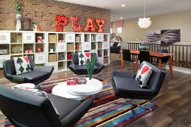 Vintage illuinated sign and gorgeous storage shelf in the living room