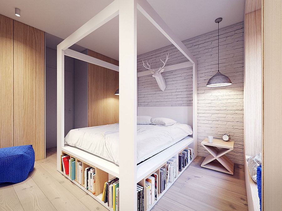 Whitewashed brick wall in the bedroom adds texture to the space
