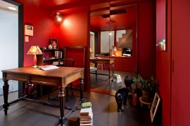 Asian eclectic home office with plenty of red