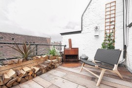 Balcony of the top floor Dutch apartment with city views