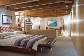Ceiling spotlights in a contemporary bedroom