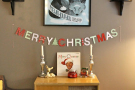 Colorful Merry Christmas banner on wall