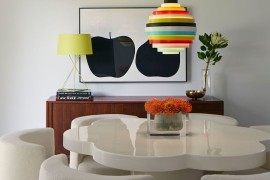 Colorful accent lighting in midcentury dining room