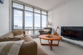 Cozy entertainmet area and reading nook of the posh apartment