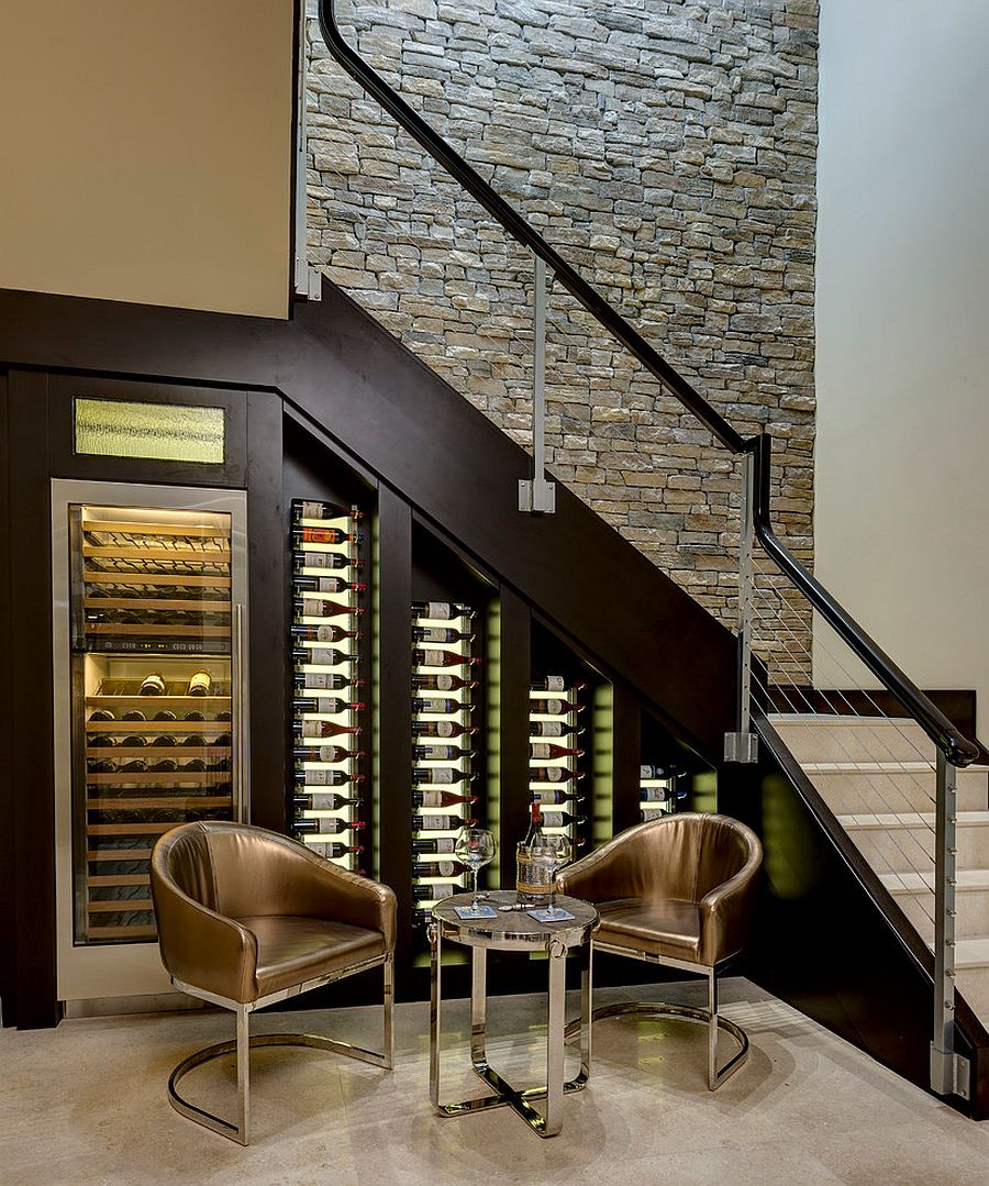 Custom built cooler with LED lighting for the wine cellar under stairs