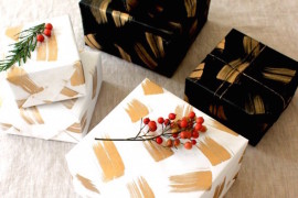 DIY holiday wrapping paper in gold, black, and white