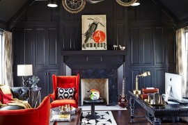 Dark sophistication and smashing decor additions create a stunning home office
