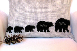 Decorative winter pillow with family of bears