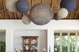 Dramatic dining room lighting with an organic vibe!