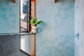 Fascinating use of blue tiles to bring texture and pattern to the modern bathroom