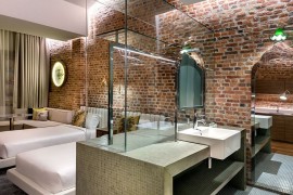 Glass and stone additions inside the suites make minimum change to the existing walls