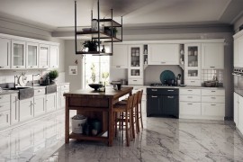 Gorgeous island in Nodato Oak offers textural contrast in the curated kitchen