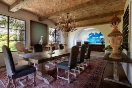 Herringbone pattern terra-cotta brickettes ceiling takes the dining room visual to a whole new level