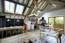 Kitchen, family room and dining space come together in this spacious interior [Design: PAD studio]