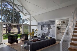 Living room of the Hupomone Ranch with a view of the scenic landscape