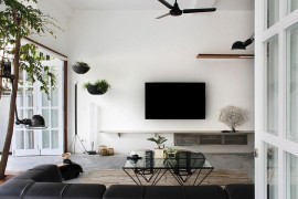 Living space of renovated home in Singapore combines love for nature and travel with minimal style