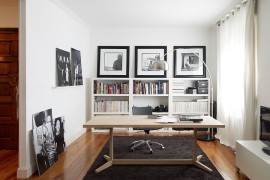 Lovely desk brings warmth of wood to the contemporary home office in black and white