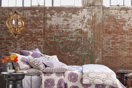 Lovely way to style a modern bedroom with exposed brick walls